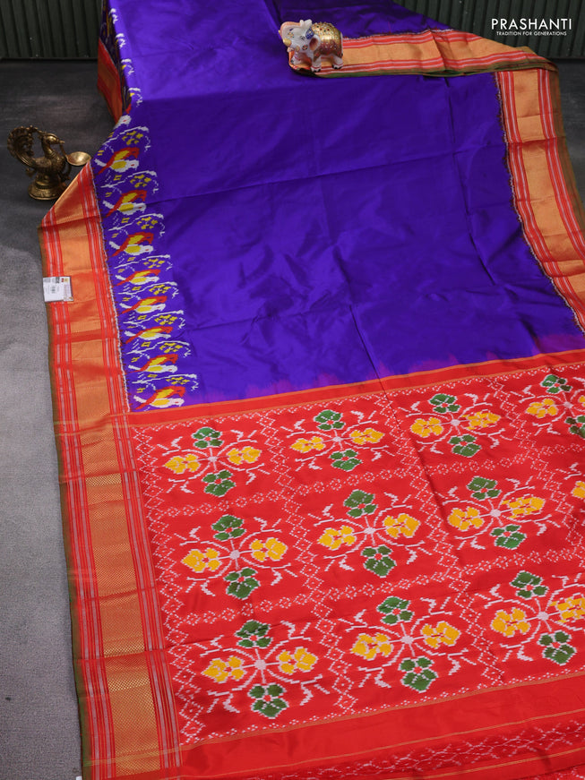 Pochampally silk saree blue and orange with plain body andlong ikat woven zari border