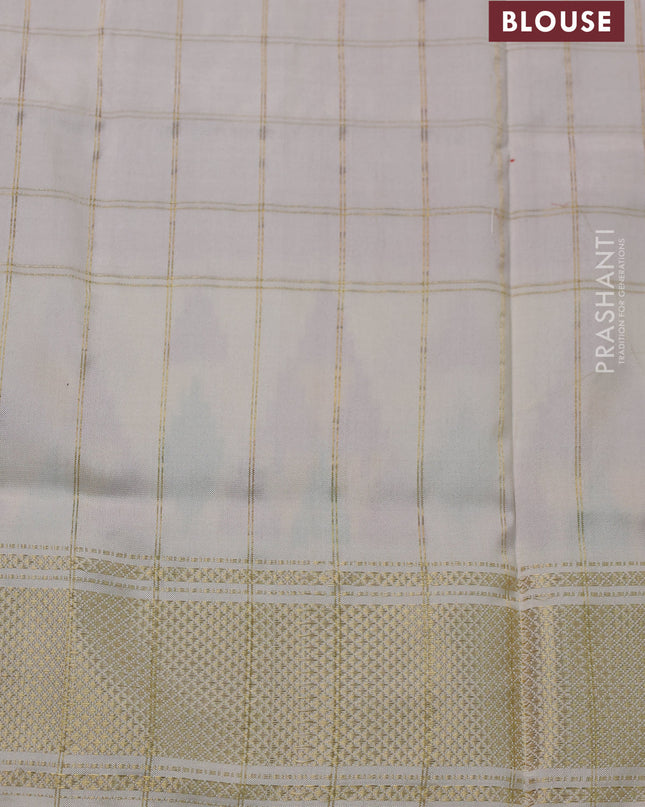 Pochampally silk saree pink and cream with allover zari checks & ikat weaves and ikat woven zari border