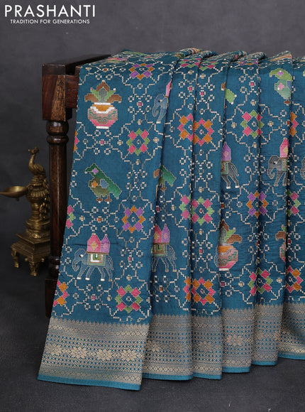 Crepe silk saree peaccock blue with allover mina weaves & sequin work and zari woven border