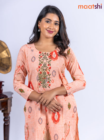 Cotton kurti set pale orange with allover ikat prints & embroidery work neck pattern and straight cut pant