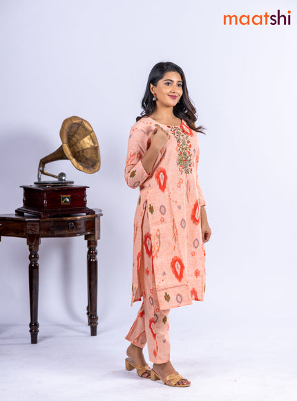 Cotton kurti set pale orange with allover ikat prints & embroidery work neck pattern and straight cut pant