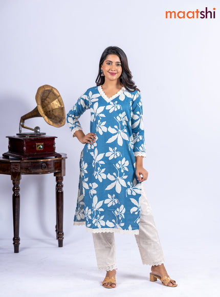 Cotton kurti set blue and off white with allover floral prints & lace work v neck pattern and straight cut pant