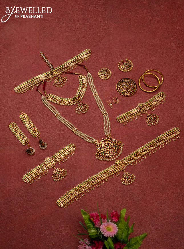 Bharathanatyam dance set with haaram,necklace,jhumka,hip belt,vanki,maang tikka,jada billai,maatal,bullaku,bangles and kemp stones & pearl hangings