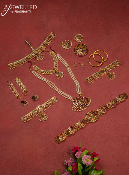 Bharathanatyam dance set with haaram,necklace,jhumka,hip belt,vanki,maang tikka,jada billai,maatal,bullaku,bangles and kemp stones & pearl hangings