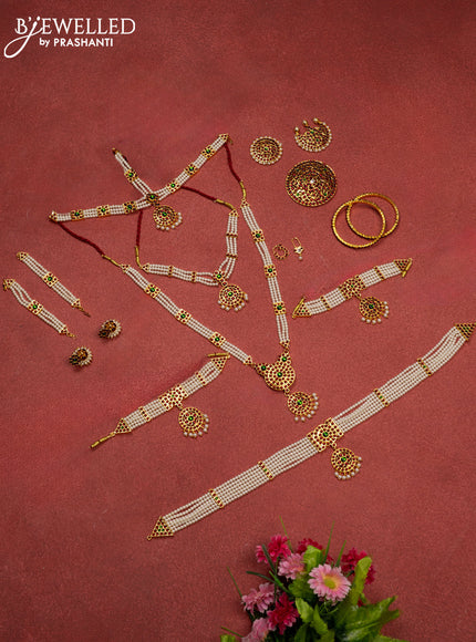 Bharathanatyam dance set with haaram,necklace,jhumka,hip belt,vanki,maang tikka,jada billai,maatal,bullaku,bangles and kemp stones & pearl hangings
