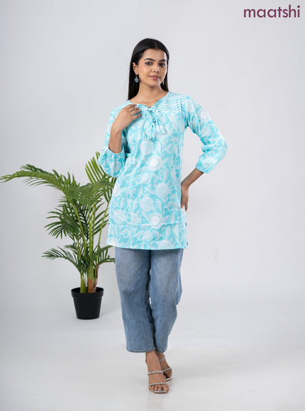 Cotton short kurti light blue and off white with allover prints & simple neck pattern without pant