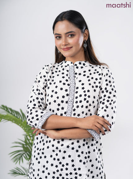 Cotton short kurti off white and black with allover star butta prints & embroidery work neck pattern without pant