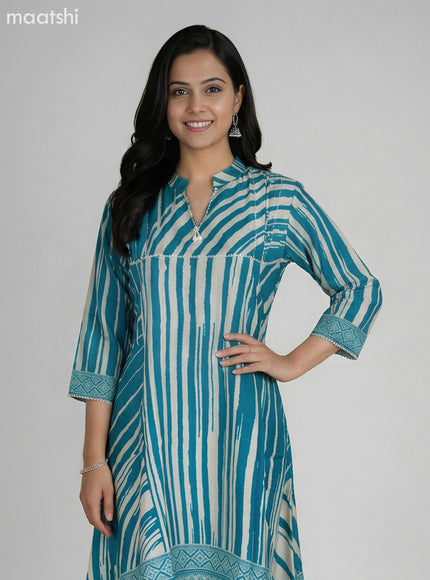 Teal Blue and Cream Muslin Printed Fish Cut Suit