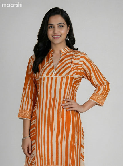 Orange and Cream Muslin Printed Fish Cut Suit