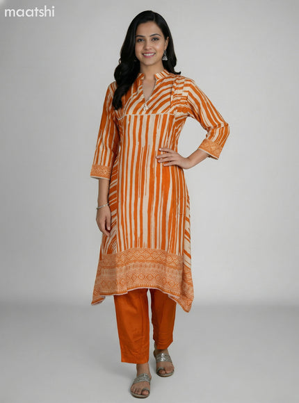 Orange and Cream Muslin Printed Fish Cut Suit
