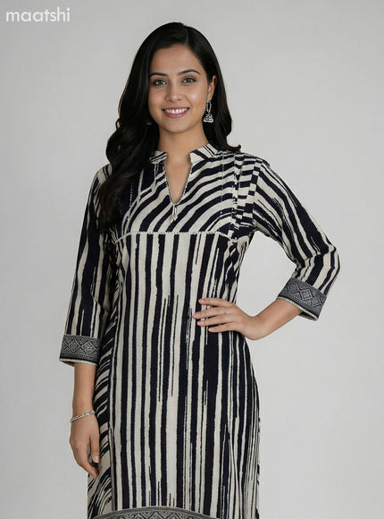 Black and Cream Muslin Printed Fish Cut Suit