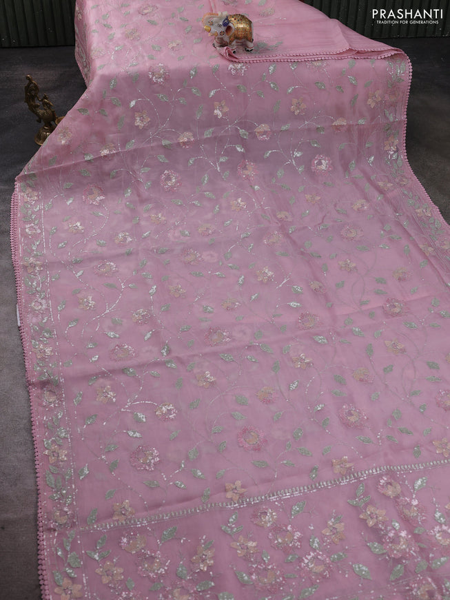 Pure organza silk saree pastel pink with allover embroidery sequin work and embroidery crocia lace work border