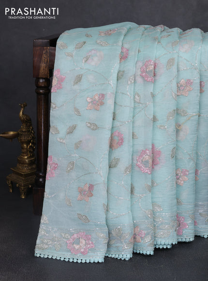 Pure organza silk saree pastel blue shade with allover embroidery sequin work and embroidery crocia lace work border