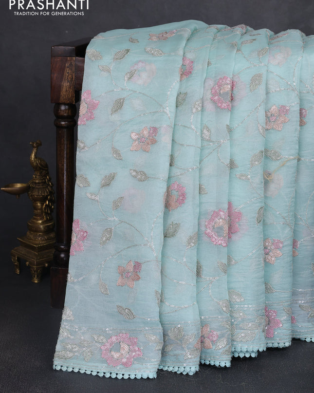 Pure organza silk saree pastel blue shade with allover embroidery sequin work and embroidery crocia lace work border