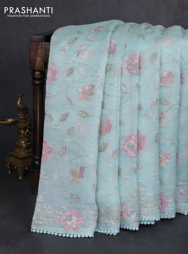 Pure organza silk saree pastel blue shade with allover embroidery sequin work and embroidery crocia lace work border
