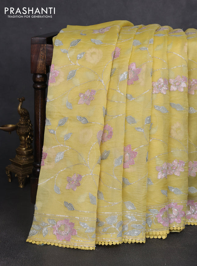 Pure organza silk saree yellow with allover embroidery sequin work and embroidery crocia lace work border
