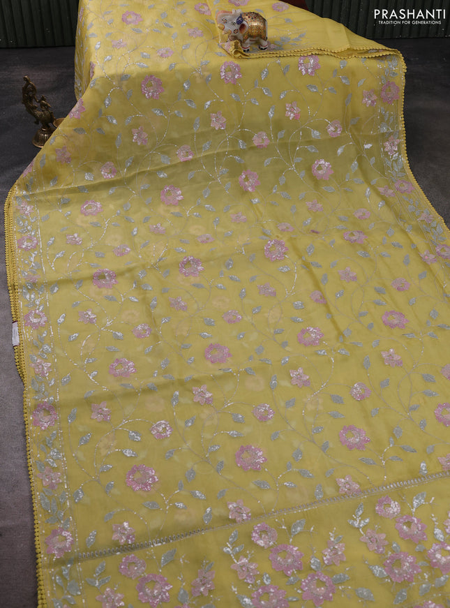 Pure organza silk saree yellow with allover embroidery sequin work and embroidery crocia lace work border