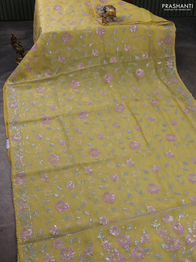 Pure organza silk saree yellow with allover embroidery sequin work and embroidery crocia lace work border