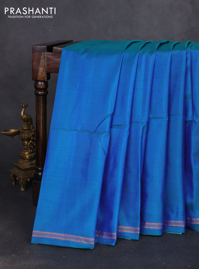 Pure soft silk saree dual shade of bluish green and rustic orange with plain body and kalamkari hand printed pallu