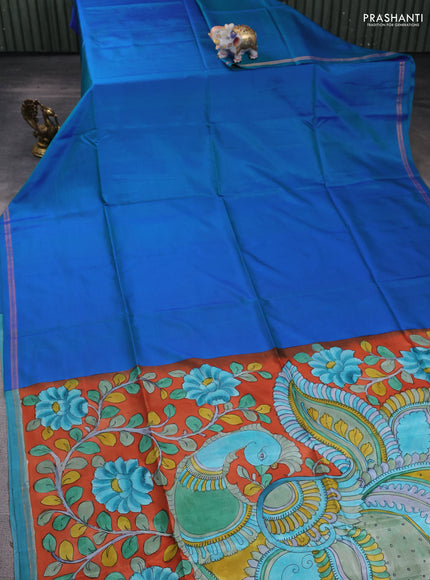 Pure soft silk saree dual shade of bluish green and rustic orange with plain body and kalamkari hand printed pallu
