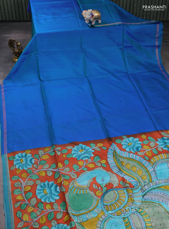 Pure soft silk saree dual shade of bluish green and rustic orange with plain body and kalamkari hand printed pallu