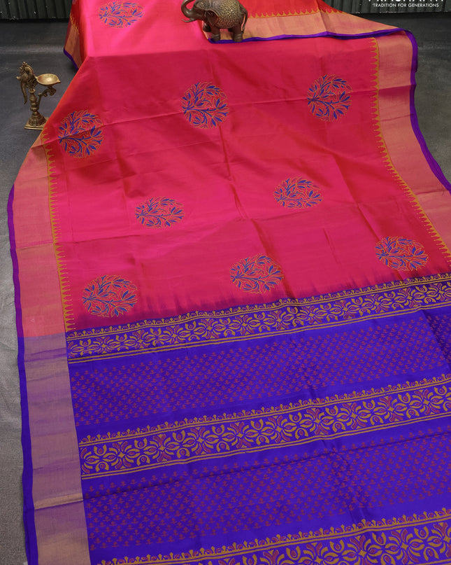 Uppada block printed saree dual shade of pinkish orange and royal blue with butta prints and zari woven border