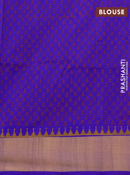 Uppada block printed saree dual shade of pinkish orange and royal blue with butta prints and zari woven border
