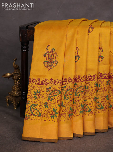 Uppada block printed saree mustard yellow and coffee brown with butta prints and long printed zari woven border