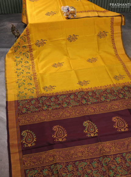 Uppada block printed saree mustard yellow and coffee brown with butta prints and long printed zari woven border
