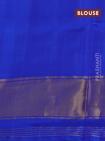 Rajkot patola silk saree orange and blue with allover ikat weaves and ikat woven simple border