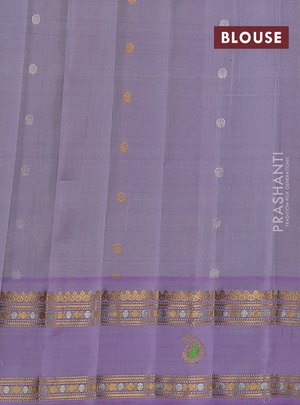 Pure gadwal silk saree pista green and mild lavender with allover silver & gold zari woven buttas and rettapet zari woven border