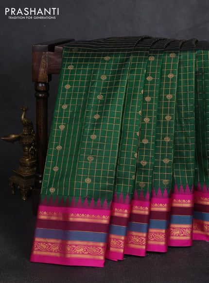 Pure gadwal silk saree green and magenta pink with allover zari checks & buttas and temple design zari woven border