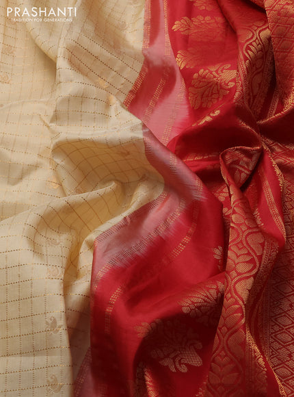 Pure gadwal silk saree sandal and red with allover zari checks & buttas and temple design zari woven border