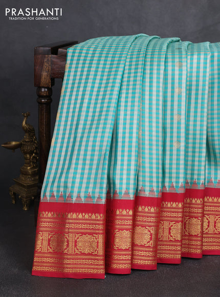 Pure gadwal silk saree off white teal green and reddish pink with allover checks & zari woven buttas and temple design zari woven border