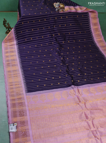 Pure gadwal silk saree navy blue and lotus pink with allover zari stripe & buttas and temple design zari woven border