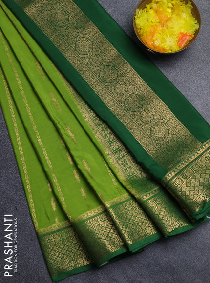 Semi mysore silk saree light green and green with allover zari weaves and zari woven border