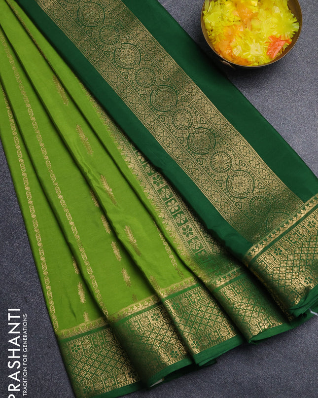Semi mysore silk saree light green and green with allover zari weaves and zari woven border