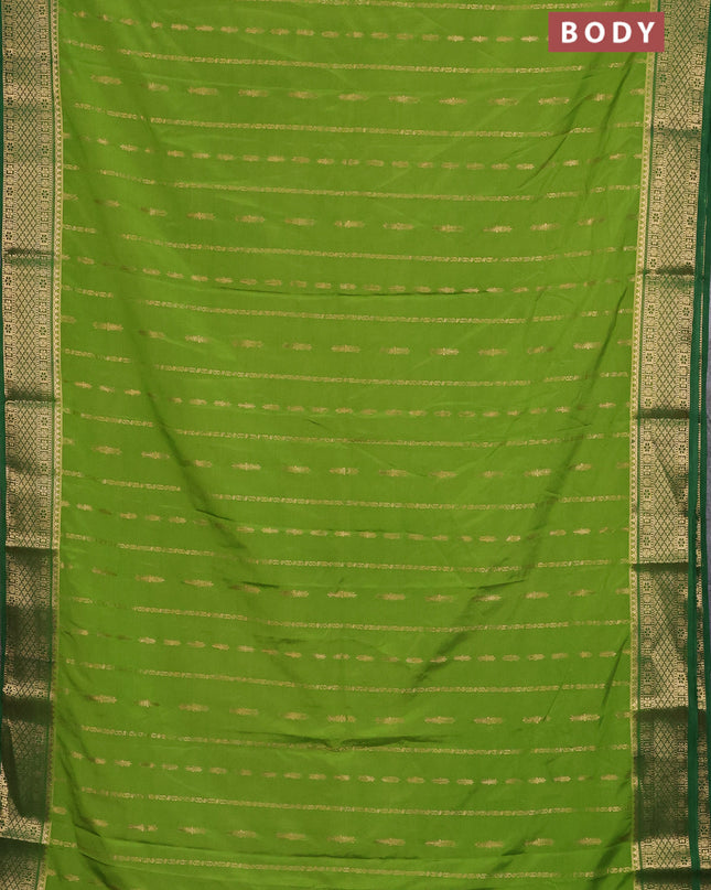 Semi mysore silk saree light green and green with allover zari weaves and zari woven border