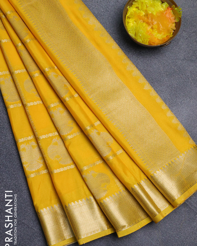 Semi mysore silk saree yellow with allover zari checks & buttas and zari woven border
