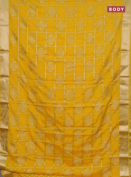 Semi mysore silk saree yellow with allover zari checks & buttas and zari woven border