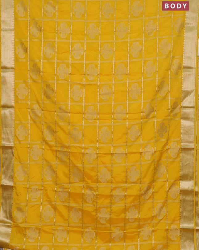 Semi mysore silk saree yellow with allover zari checks & buttas and zari woven border