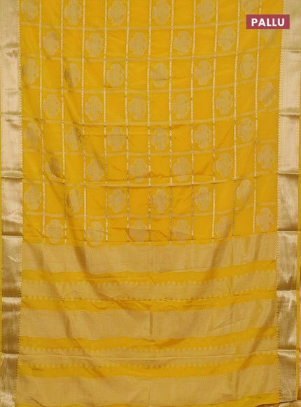 Semi mysore silk saree yellow with allover zari checks & buttas and zari woven border