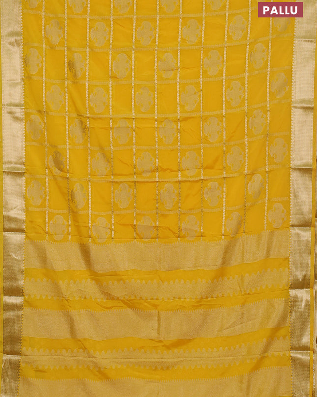 Semi mysore silk saree yellow with allover zari checks & buttas and zari woven border