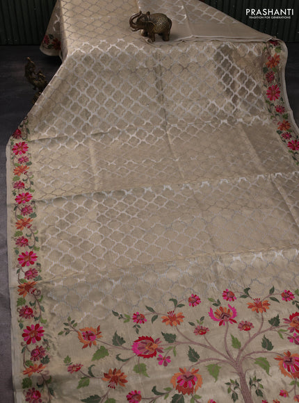 Tissue saree gold with allover zari woven brocade weaves and embroidery work border