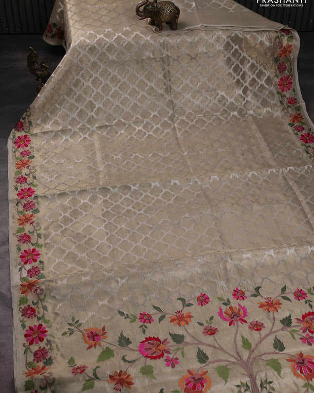 Tissue saree gold with allover zari woven brocade weaves and embroidery work border