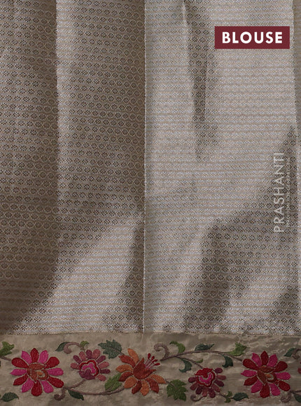 Tissue saree gold with allover zari woven brocade weaves and embroidery work border