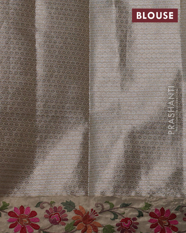 Tissue saree gold with allover zari woven brocade weaves and embroidery work border