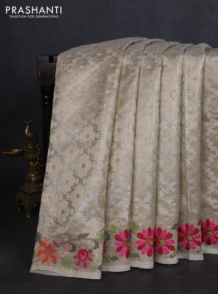 Tissue saree gold with allover zari woven brocade weaves and embroidery work border