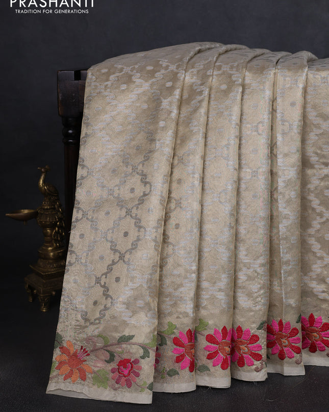 Tissue saree gold with allover zari woven brocade weaves and embroidery work border