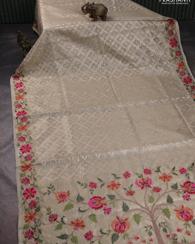 Tissue saree gold with allover zari woven brocade weaves and embroidery work border